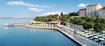 โรงแรมเนปจูน – ไลฟ์คลาสโรงแรมและสปา, ปอร์โตโรซ