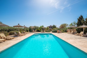 Outdoor pool, pool umbrellas, pool loungers