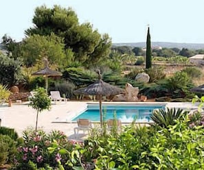 Outdoor pool, pool umbrellas, sun loungers