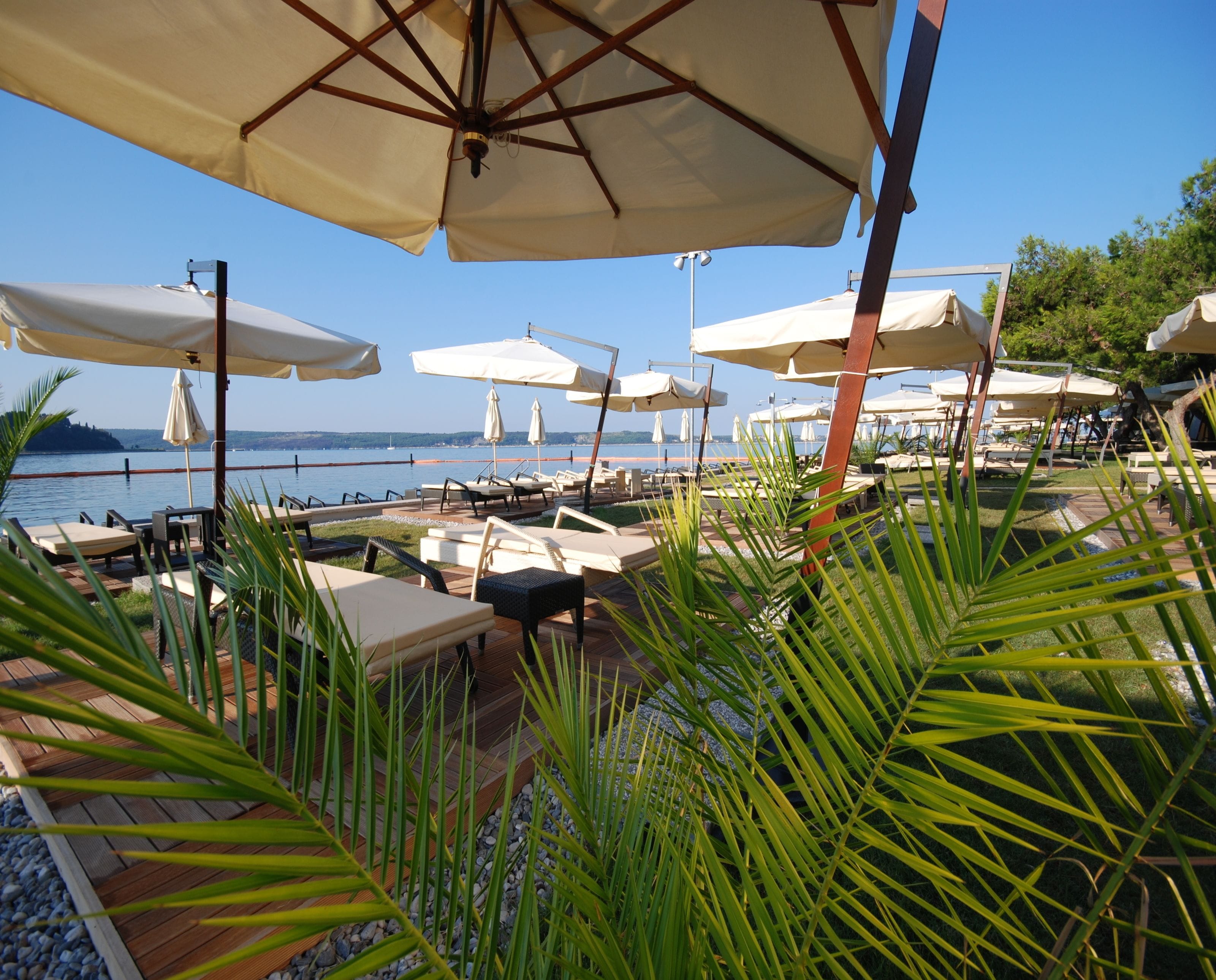 private beach nearby, beach umbrellas, beach towels, beach massages