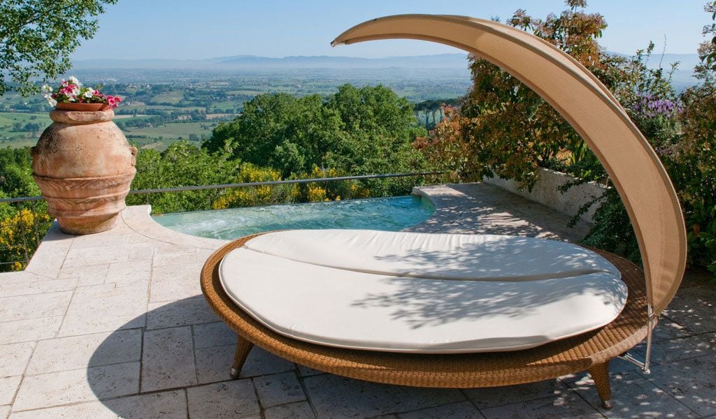 Outdoor pool, open 9:00 AM to 7 PM, pool umbrellas, sun loungers