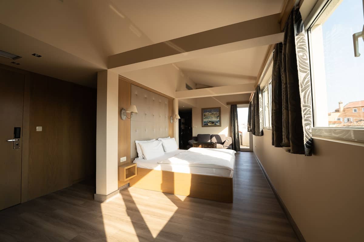 one-bedroom suite with balcony and city view | 1 bedroom, minibar, in-room safe, desk