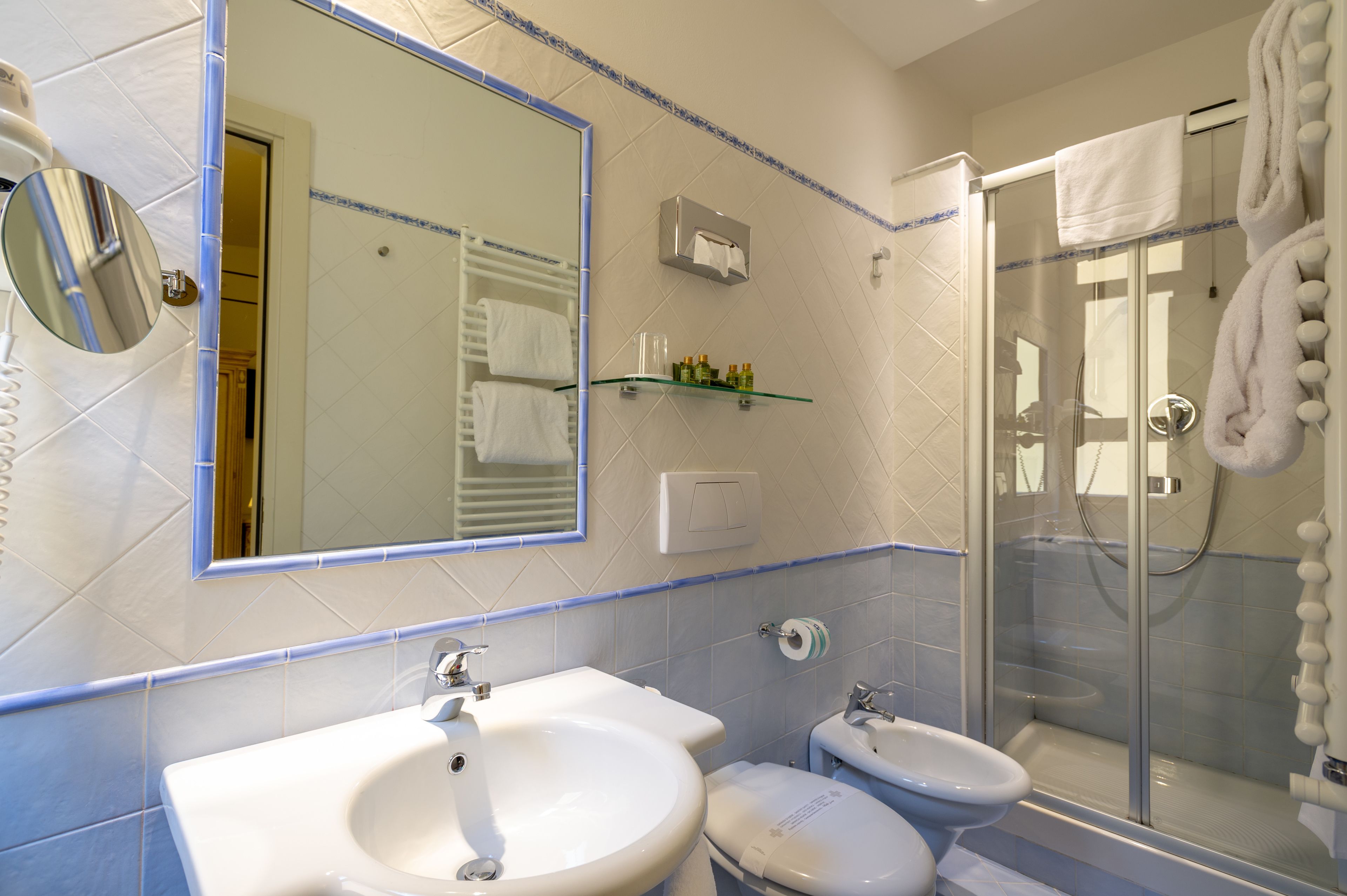 classic double room | bathroom | shower, free toiletries, hair dryer, towels