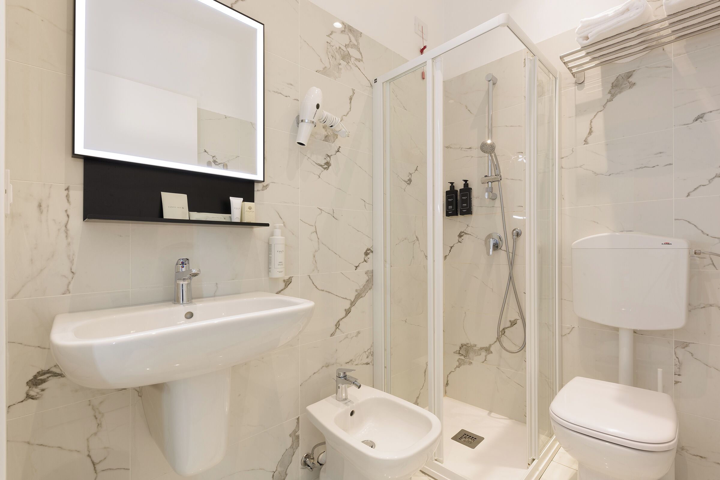 Rainfall showerhead, free toiletries, hair dryer, towels