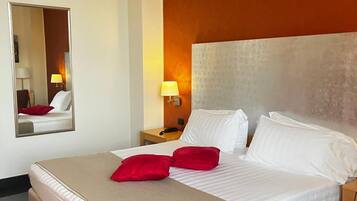 Biancheria da letto di alta qualità, minibar, cassaforte in camera