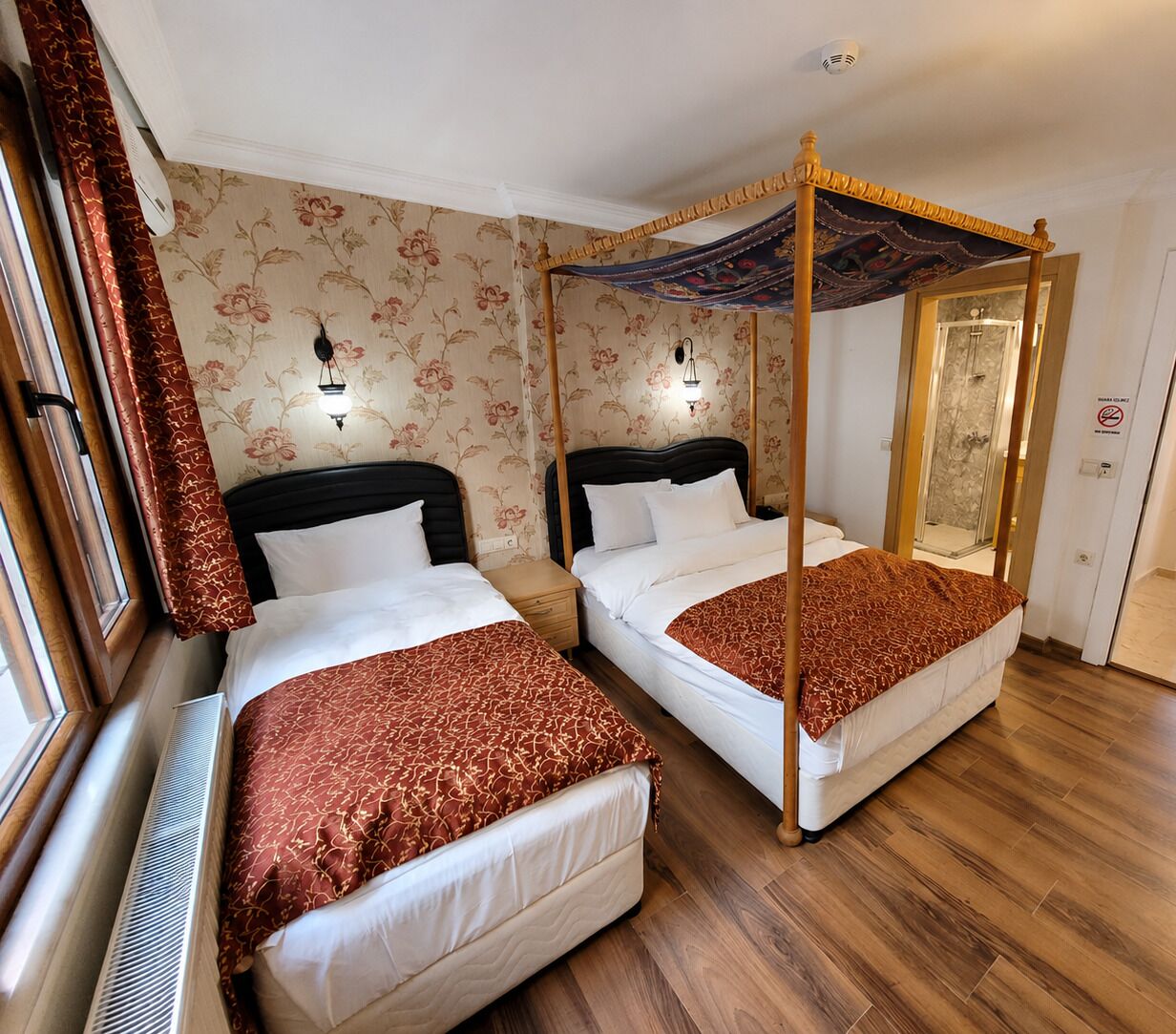 Een minibar, een kluis op de kamer, een bureau, gratis wifi