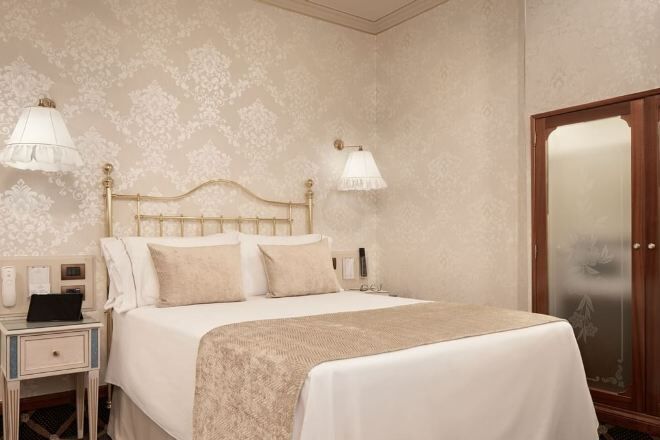 Premium bedding, down duvets, Select Comfort beds, in-room safe