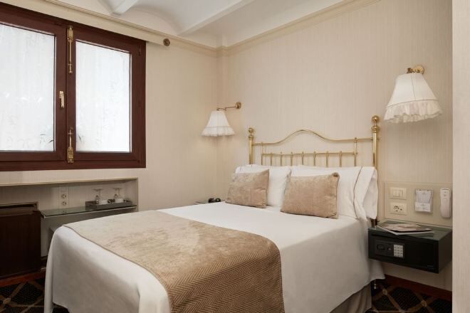 Premium bedding, down duvets, Select Comfort beds, in-room safe