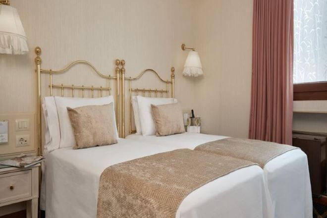 Premium bedding, down duvets, Select Comfort beds, in-room safe