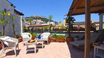 Suite superior, vista a la ciudad | Terraza o patio