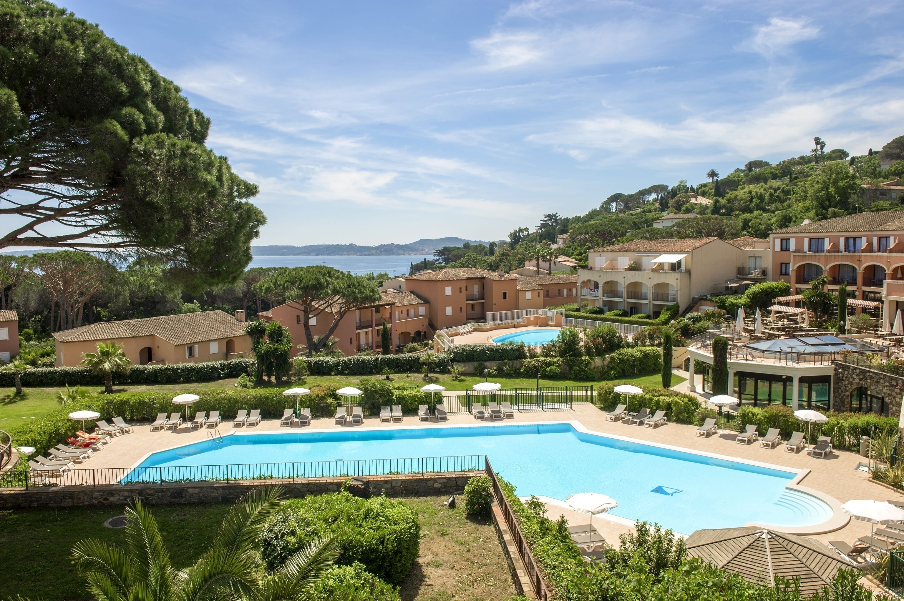 indoor pool, outdoor pool, open 8:00 am to 9:00 pm, pool umbrellas