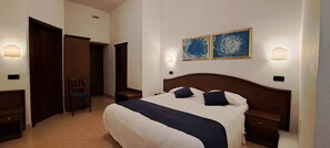 Habitació triple | Llençols italians de la marca Frette i roba de llit hipoal·lergògena 