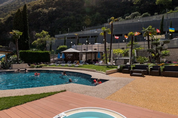 Seasonal outdoor pool, open 9:00 AM to 6:00 PM, pool umbrellas