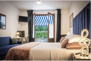 Basic Double Room, Garden View | Hypo-allergenic bedding, in-room safe, desk, soundproofing