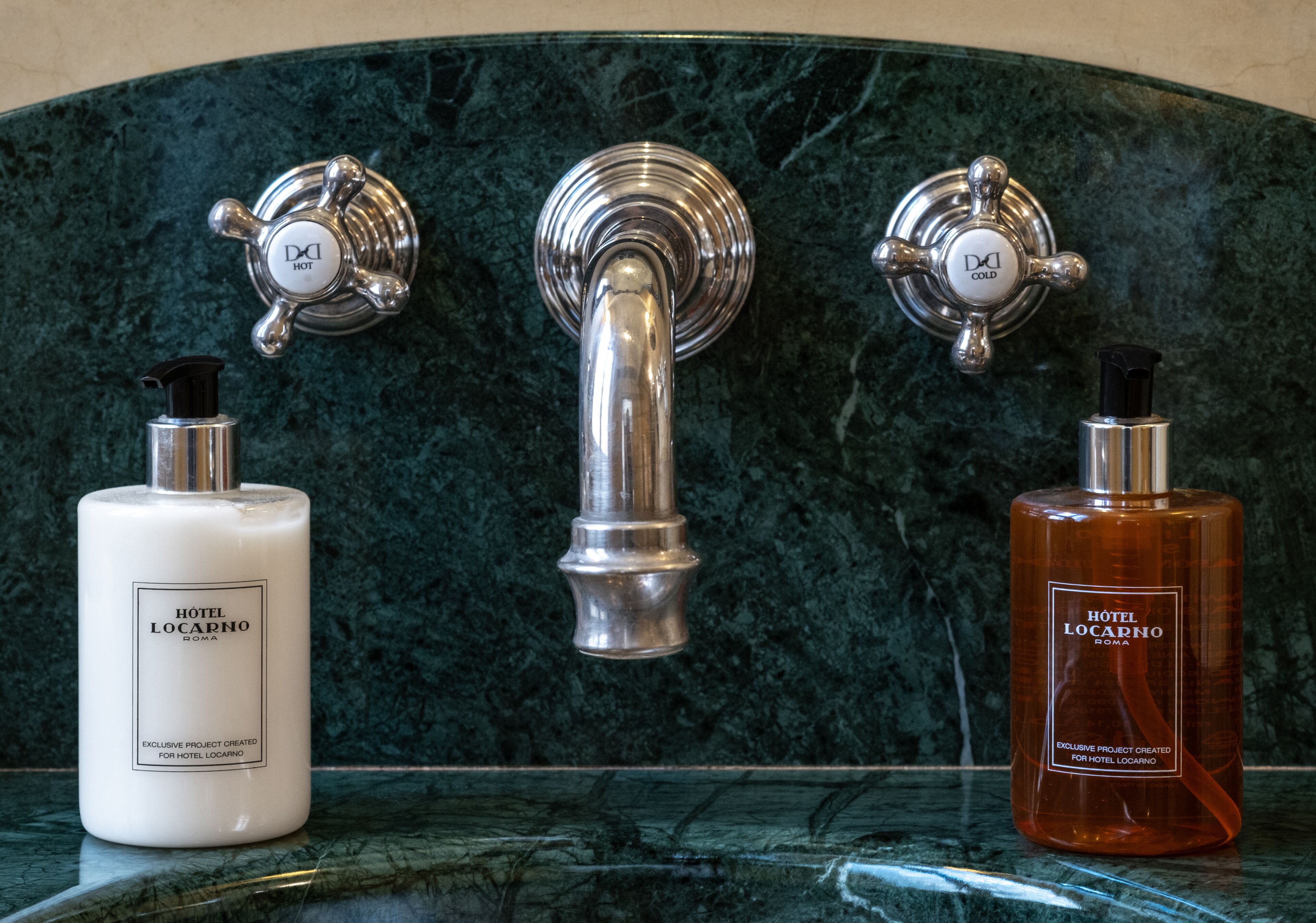 designer toiletries, hair dryer, bathrobes, slippers