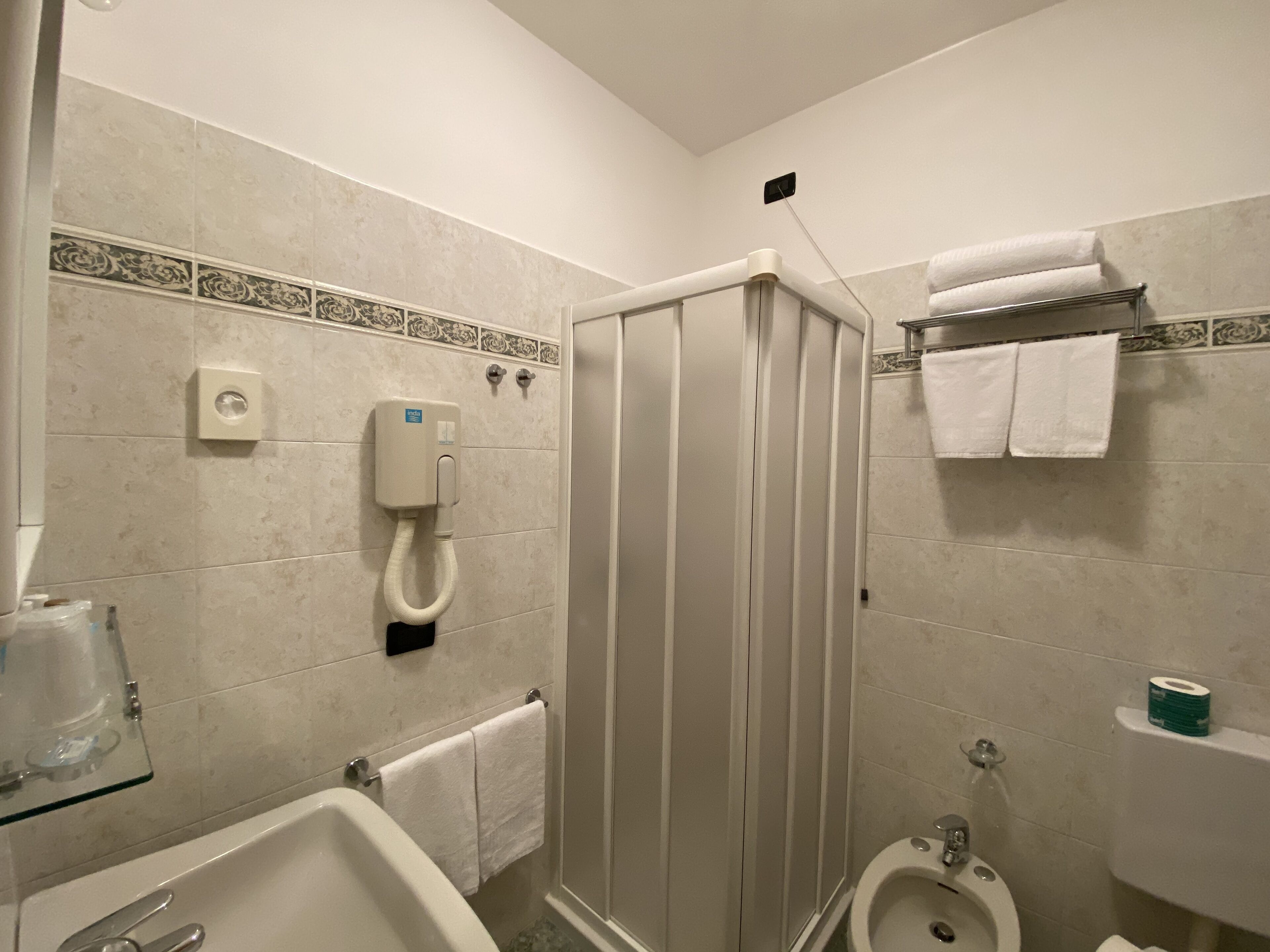 shower, free toiletries, hair dryer, towels