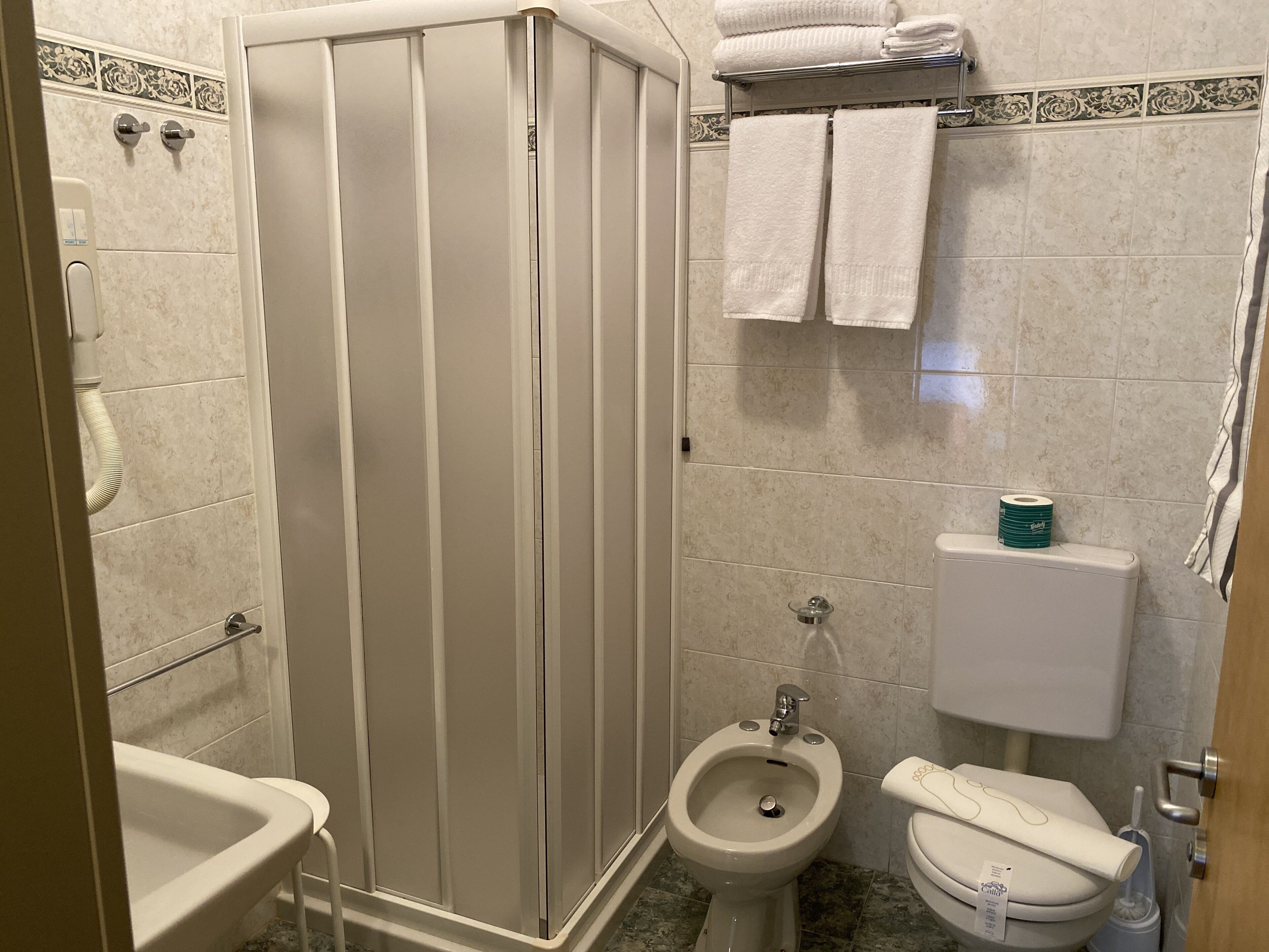 shower, free toiletries, hair dryer, towels