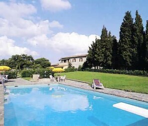 Seasonal outdoor pool, pool umbrellas, pool loungers