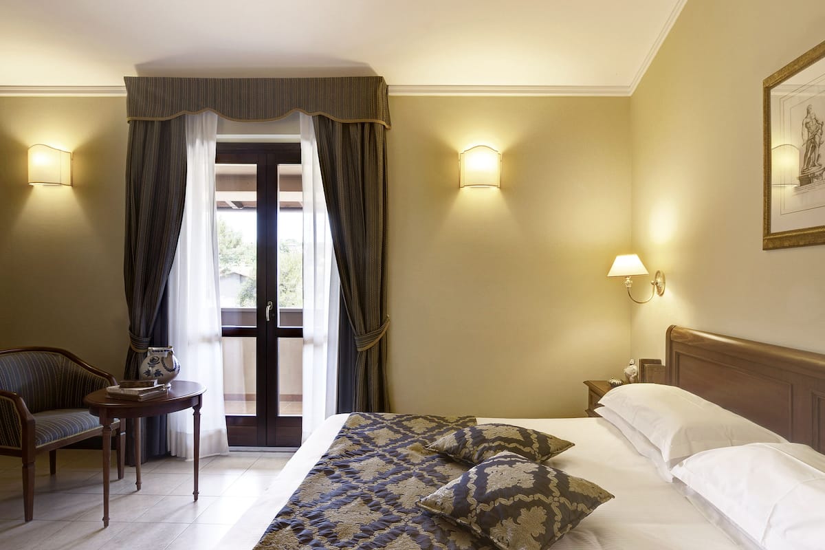 1 slaapkamer, donzen dekbedden, een minibar, een kluis op de kamer