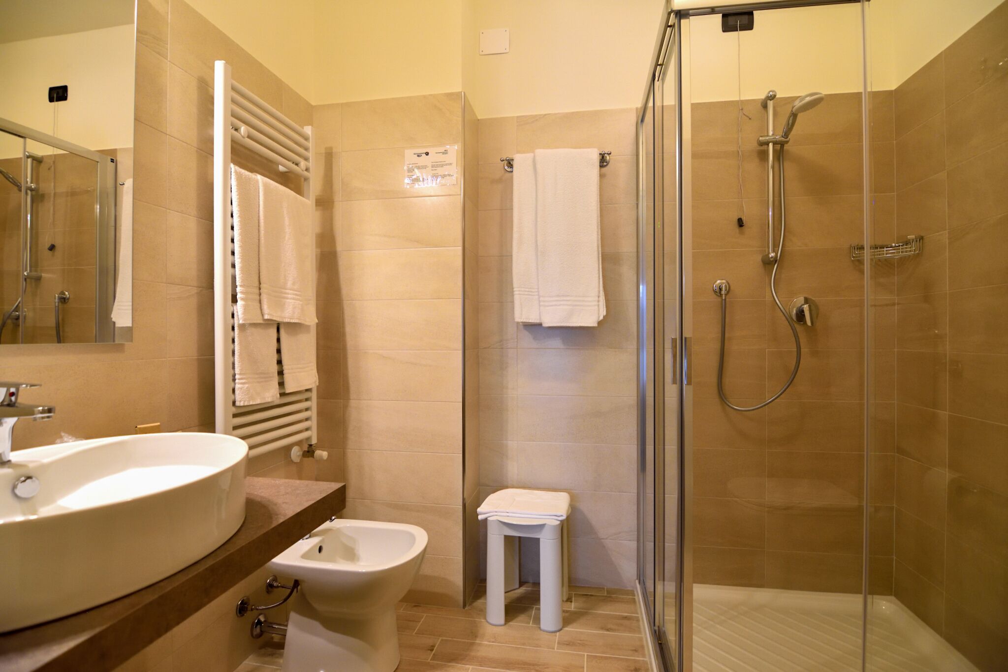 deluxe room, balcony, lake view | bathroom | shower, free toiletries, hair dryer, slippers