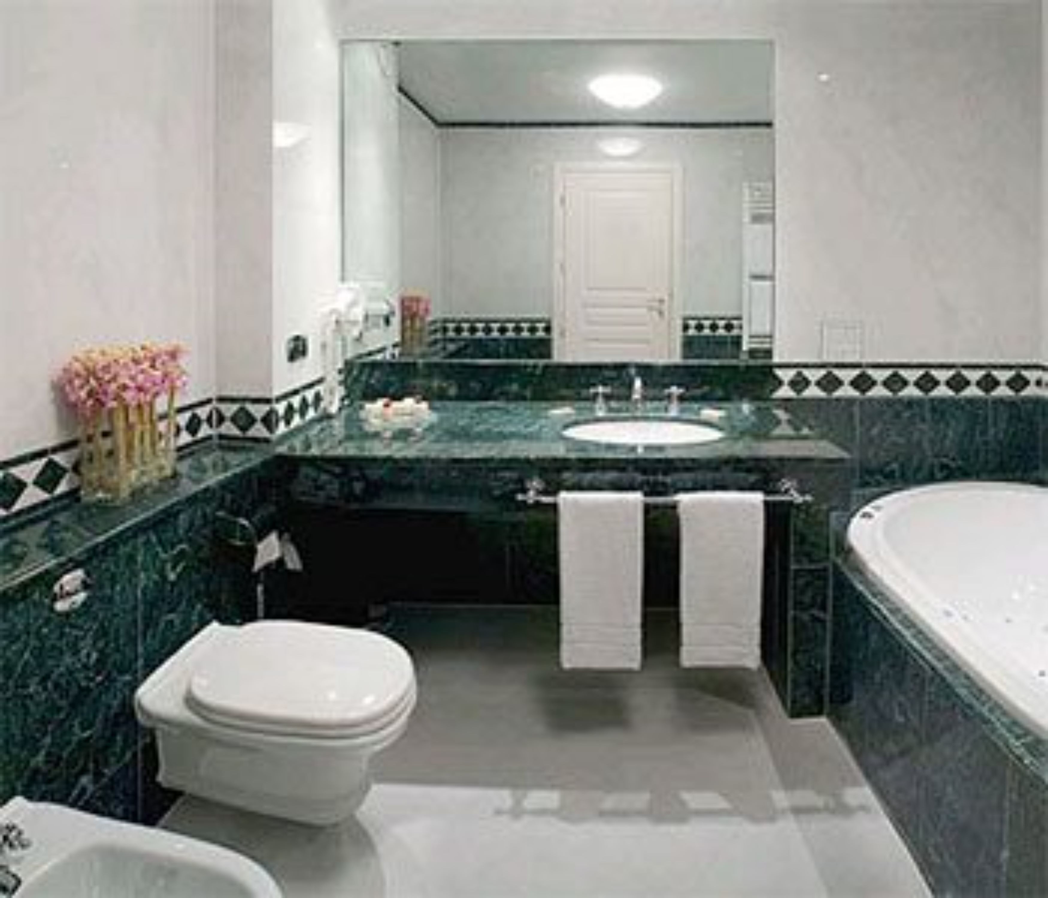 suite, hot tub | bathroom | hair dryer, slippers, bidet, towels