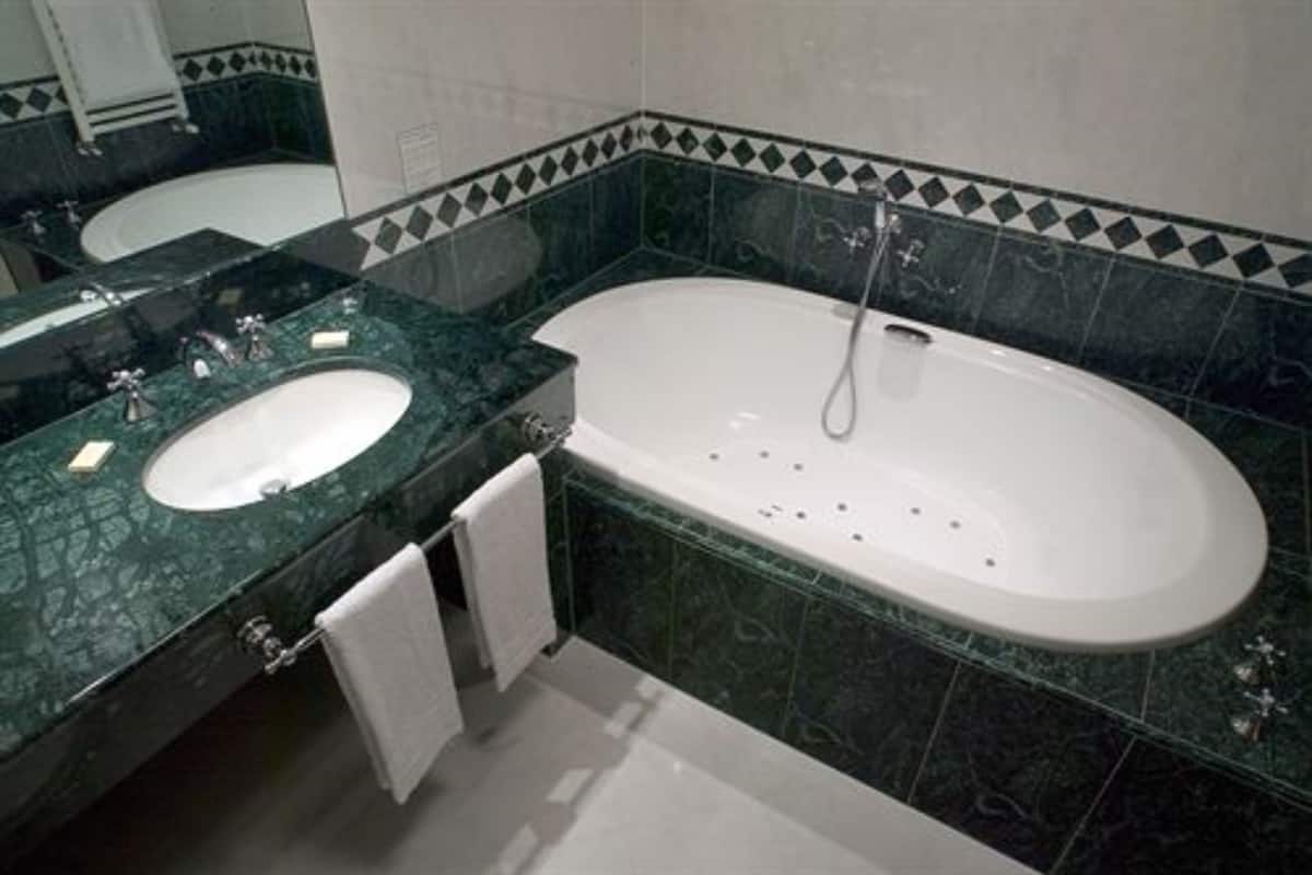 suite, hot tub | bathroom | hair dryer, slippers, bidet, towels