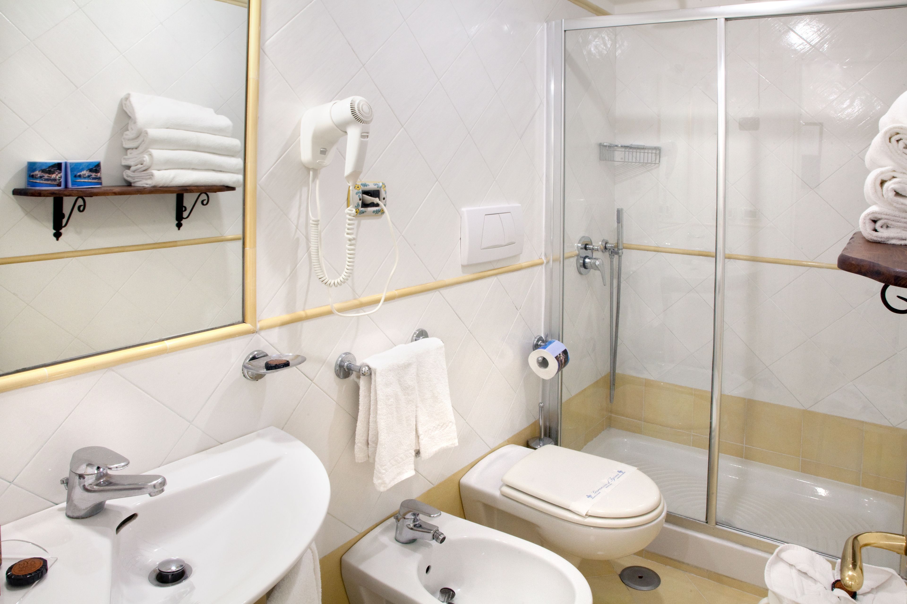 comfort room | bathroom | shower, rainfall showerhead, hair dryer, slippers