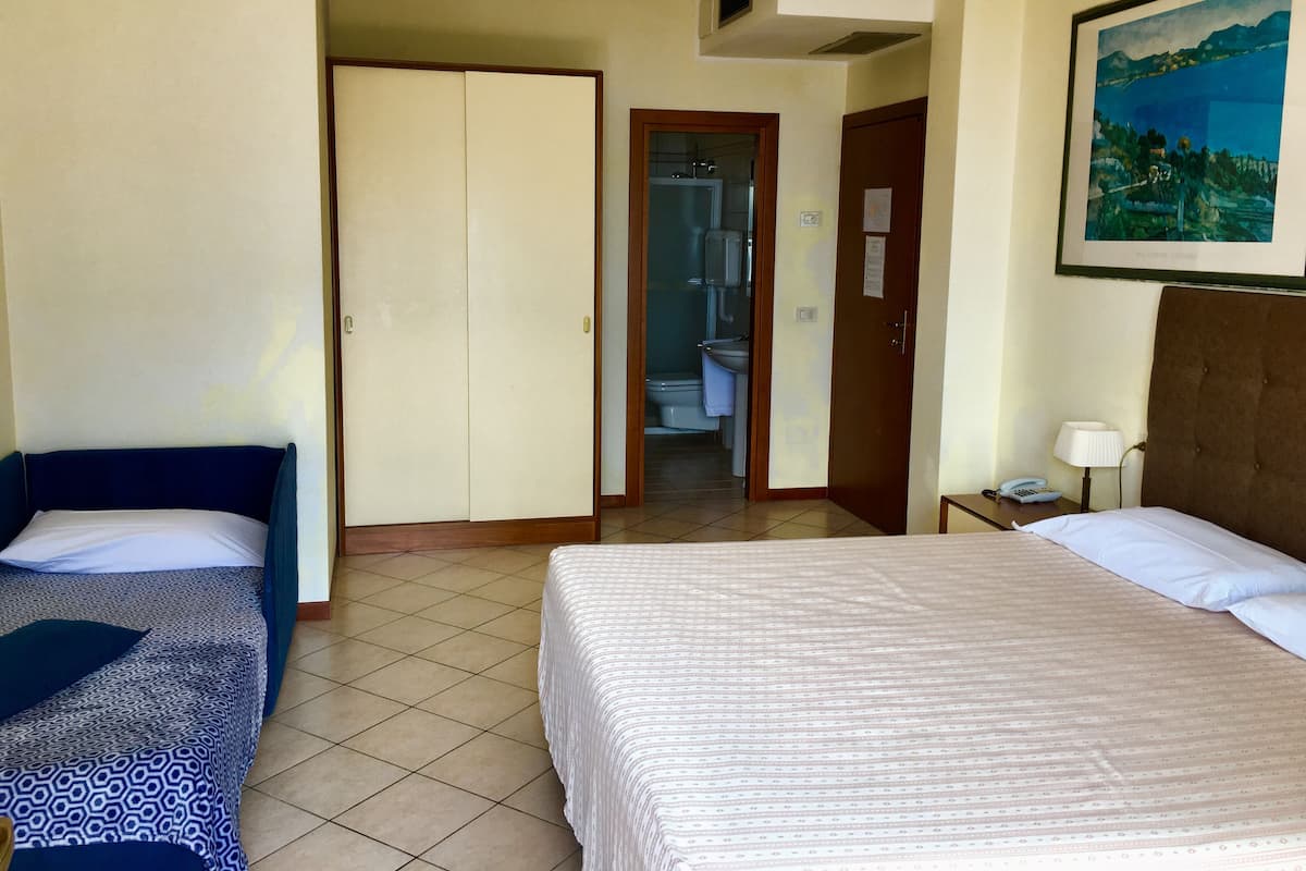 Triple Room, Lake View | Minibar, in-room safe, desk, blackout curtains