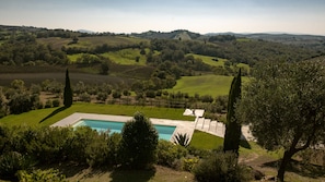 Outdoor pool, a rooftop pool, open 9:00 AM to 8:00 PM, pool umbrellas