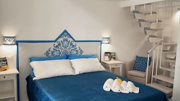 Family Quadruple Room, 2 Queen Beds, Terrace | Minibar, in-room safe, desk, blackout drapes
