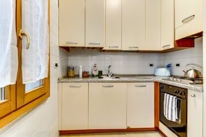 Standard Apartment | Private kitchen | Fridge