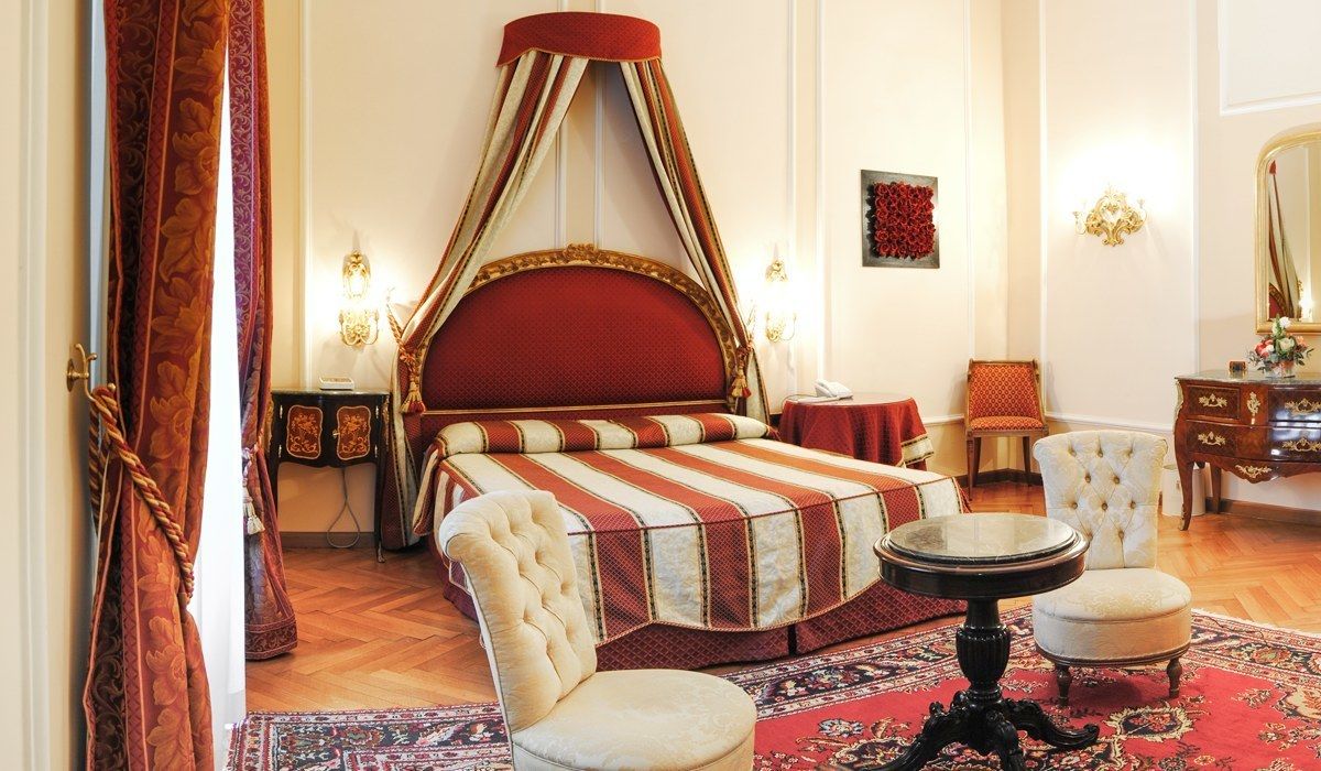 junior suite | minibar, in-room safe, desk, iron/ironing board