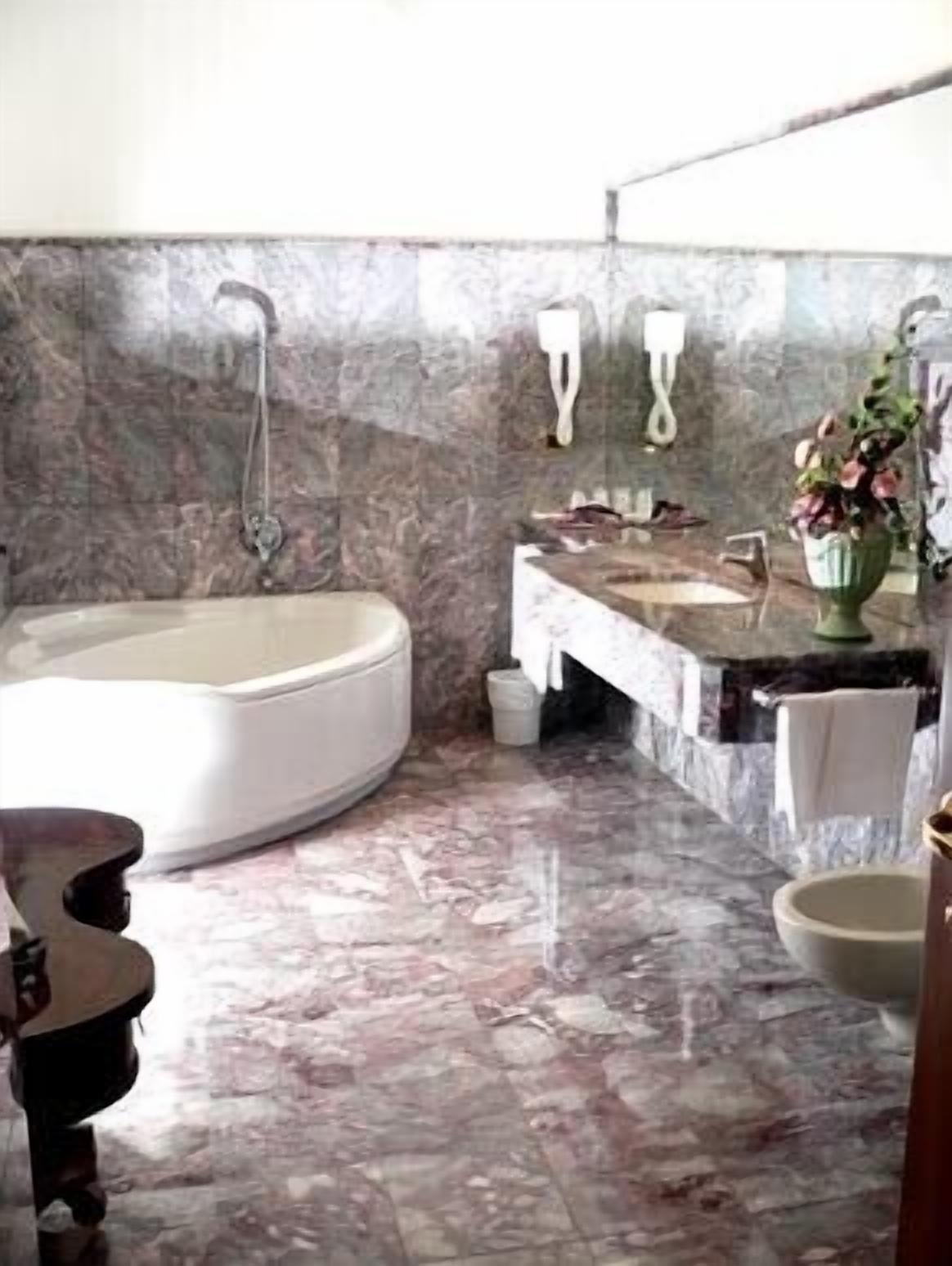 free toiletries, hair dryer, bidet, towels