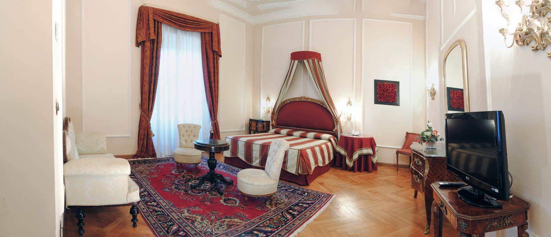 junior suite | minibar, in-room safe, desk, iron/ironing board