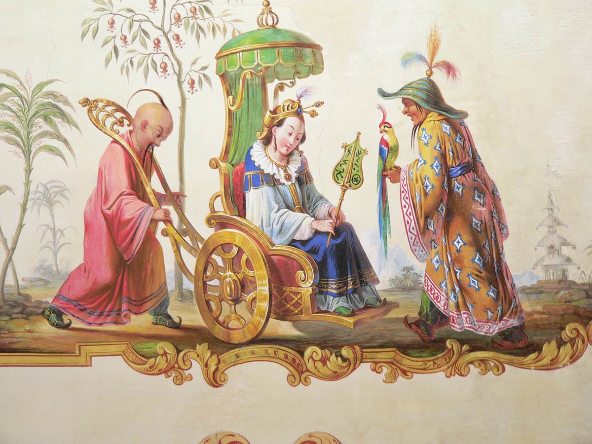 A traditional scene with a carriage, a woman in blue, and two men in red and yellow robes.