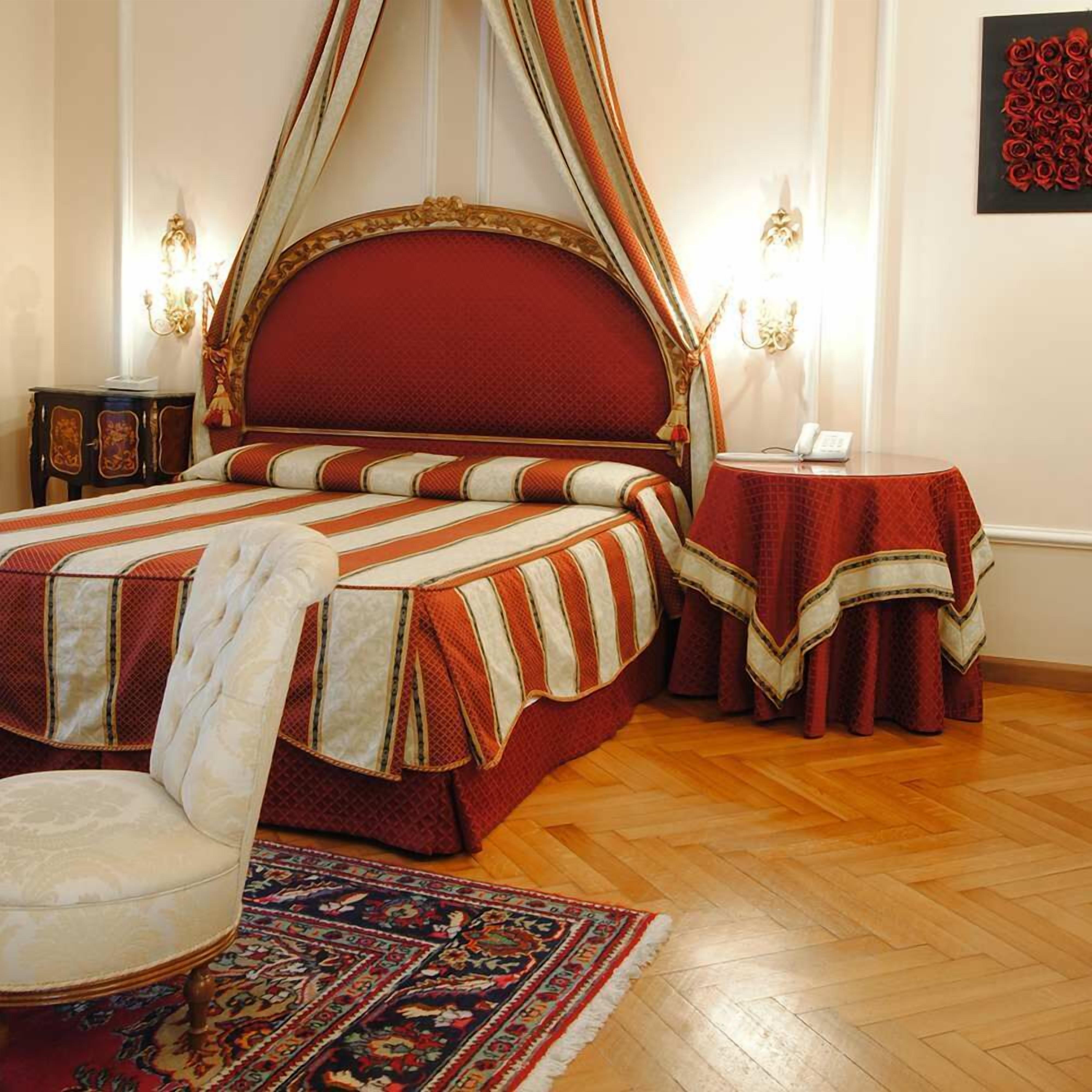 junior suite | minibar, in-room safe, desk, iron/ironing board