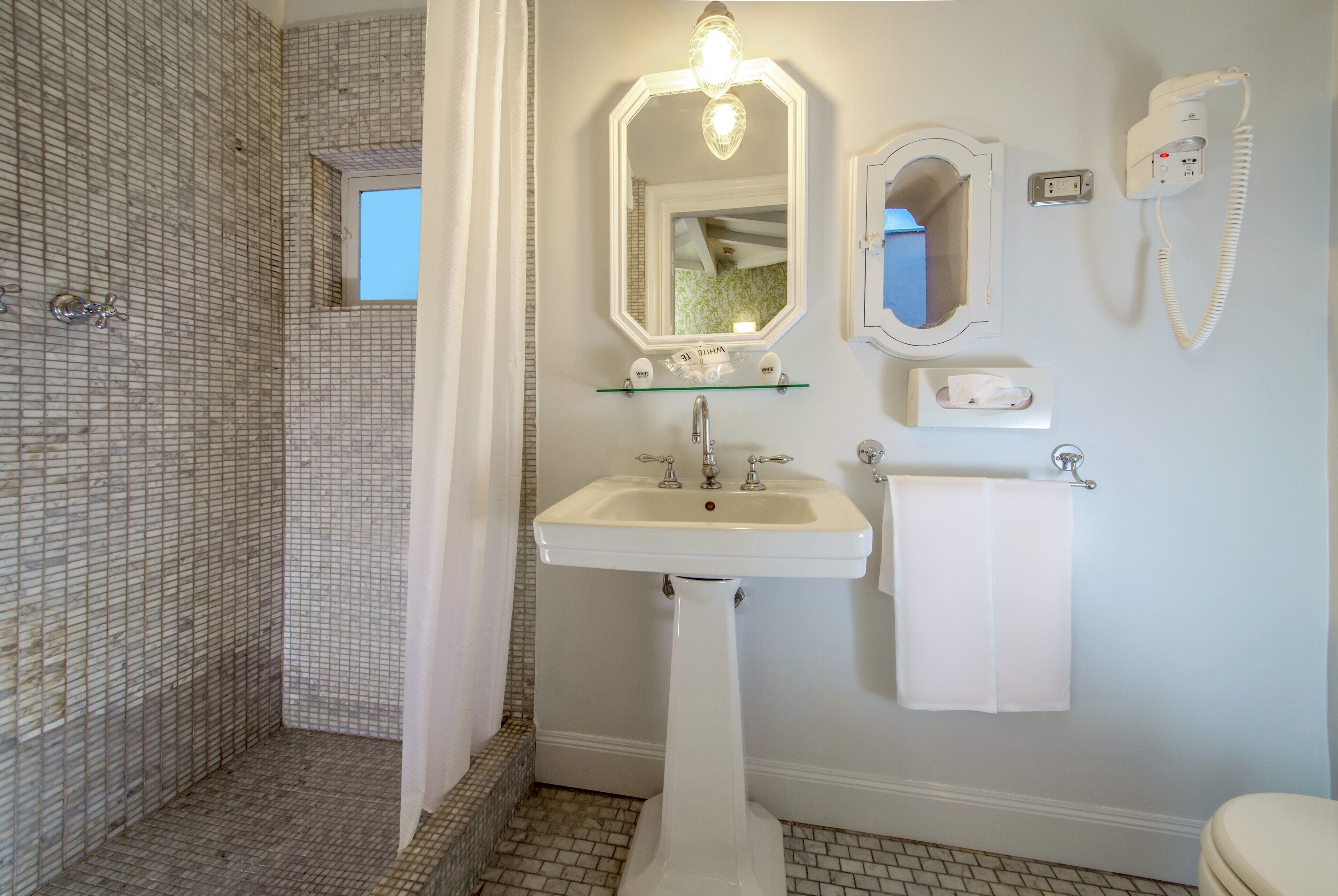 shower, rainfall showerhead, designer toiletries, hair dryer