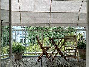 Familie suite, keuken, uitzicht op het water | Een bureau, een strijkplank/strijkijzer, gratis wifi, beddengoed