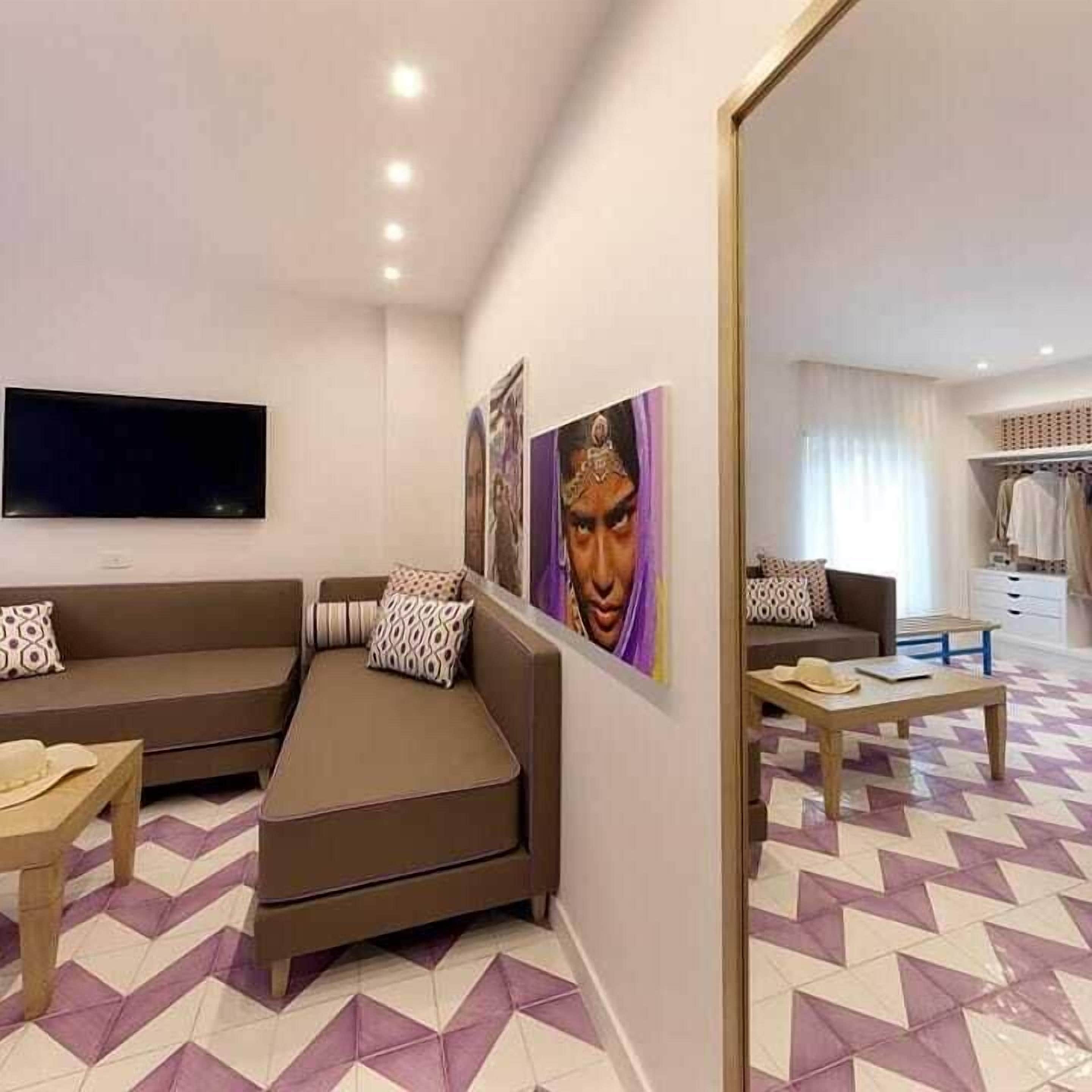 Quadruple Room | Frette Italian sheets, down duvets, memory-foam beds, minibar