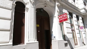 A hotel entrance with a sign reading "HOTEL ANDREAS." - Hotel Pension Andreas (Vienna)