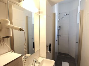 Classic Single Room | Bathroom | Shower, hair dryer, towels, soap