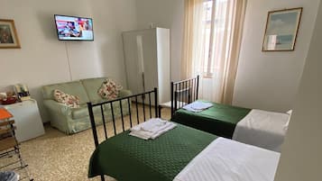 Basic Twin Room | Minibar, blackout curtains, iron/ironing board, free WiFi