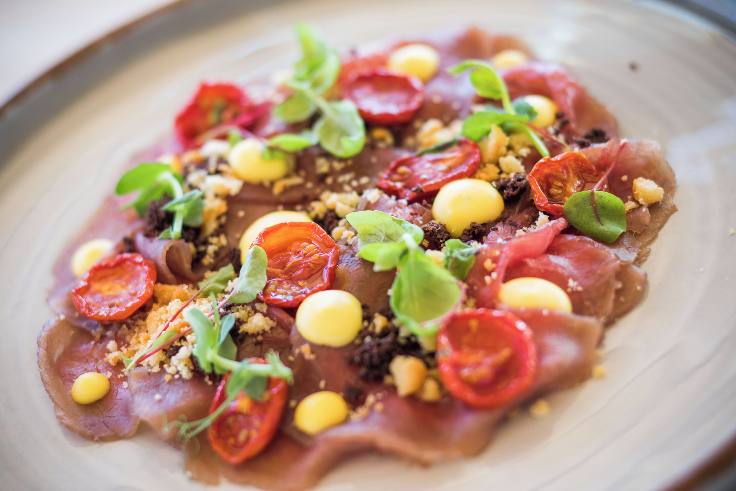 A plate of food with various toppings.