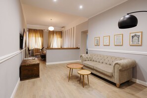 Standard Apartment | Living area | Flat-screen TV, first-run movies, pay movies