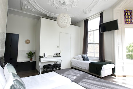 Triple Room, Private Bathroom, Canal View | Desk, blackout drapes, iron/ironing board, free WiFi