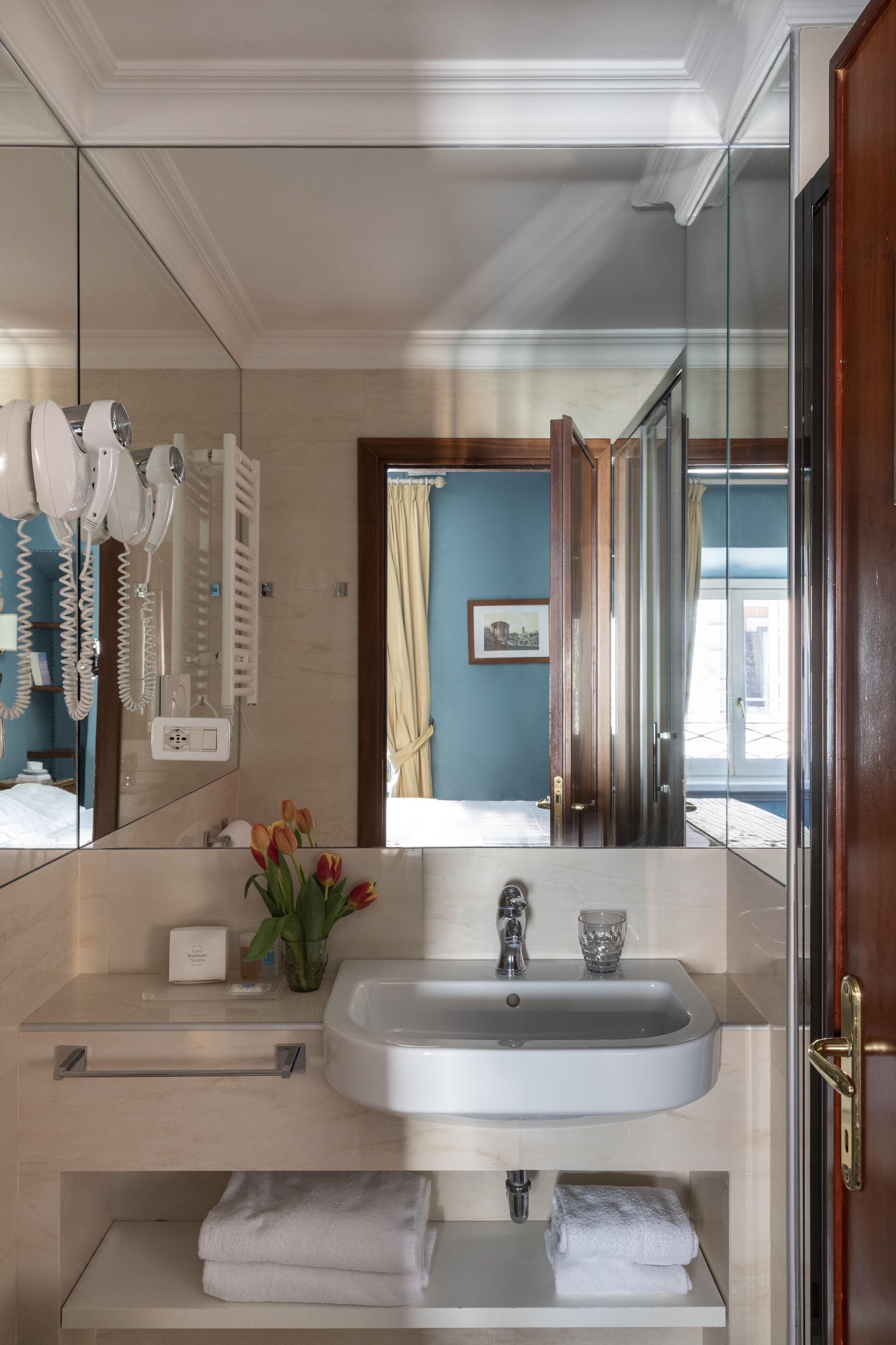 rainfall showerhead, free toiletries, hair dryer, slippers