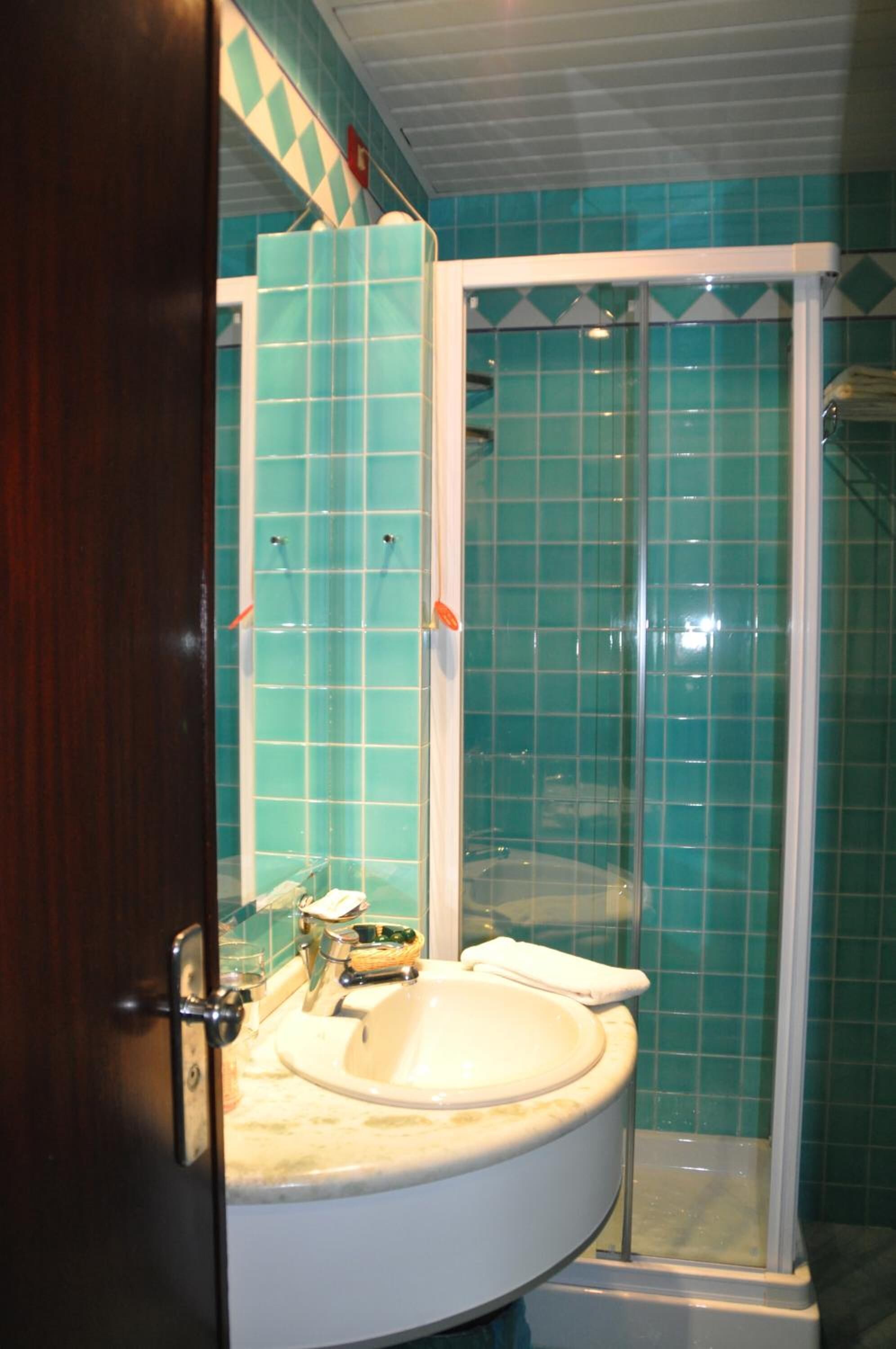 free toiletries, hair dryer, bidet, towels