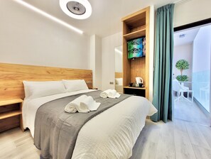 Coffres-forts dans les chambres, bureau, fer et planche à repasser