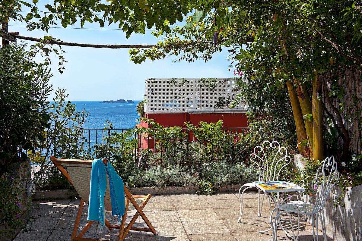 Standard Double Room, Partial Sea View | Minibar, in-room safe, desk, blackout drapes