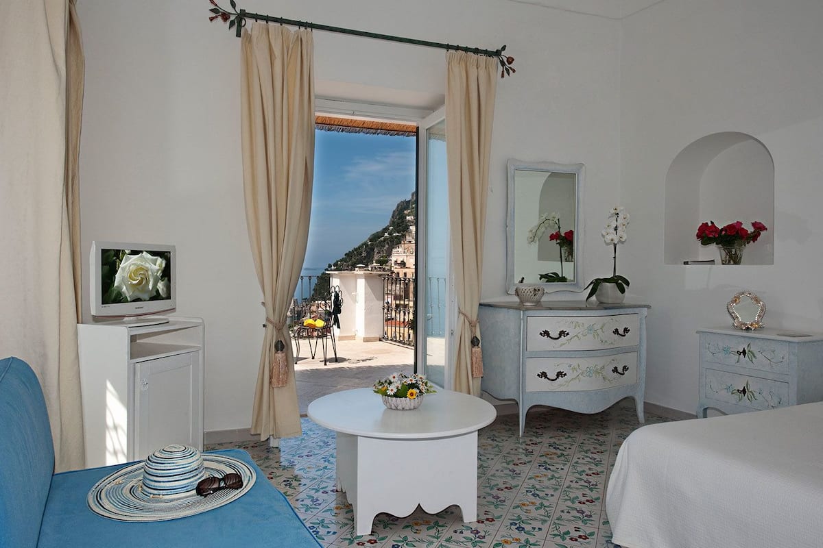 Apartment (Two Bedroom, Sea View) | Minibar, in-room safe, desk, blackout drapes